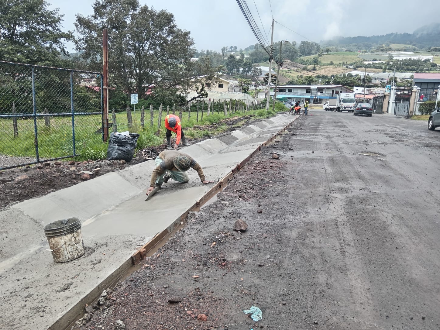 Construcción de aceras y cordón de caño